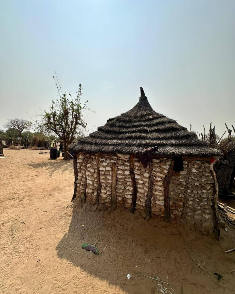 Traditional thatched hut seen on a village tour near Nkurenkuru