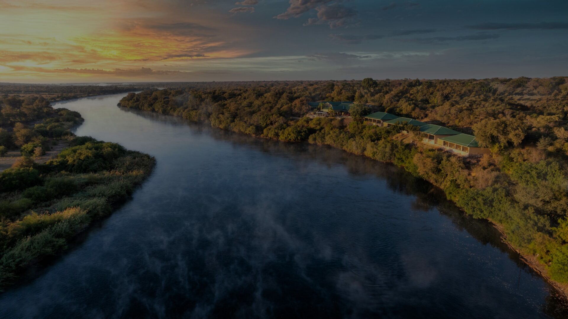 Aerial view of the Okavango River winding past Simanya River Lodge