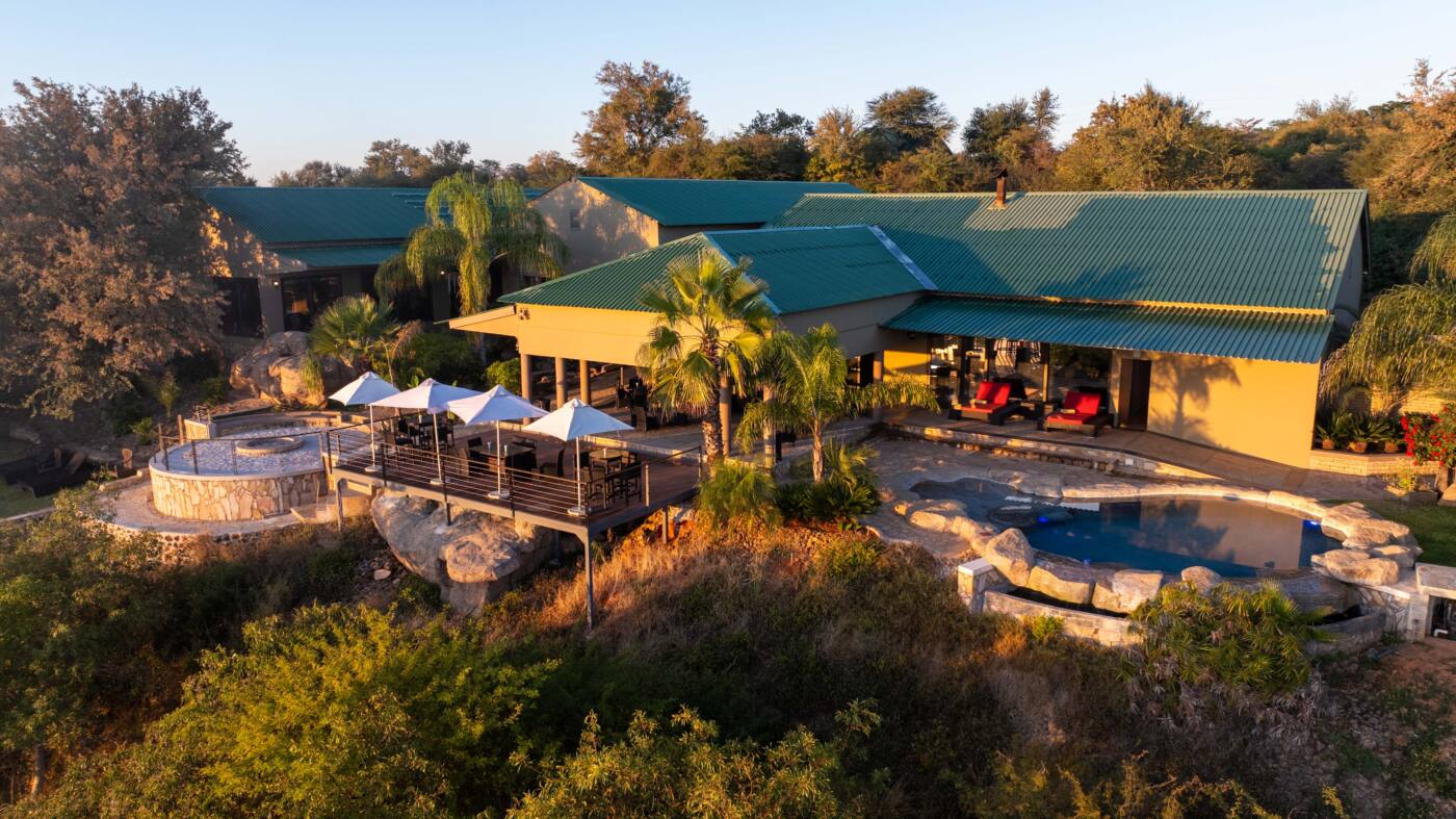 Aerial view of Simanya River Lodge and its pool