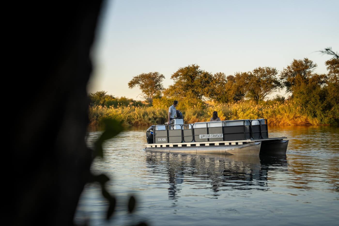 Boat on the Kavango River at dusk